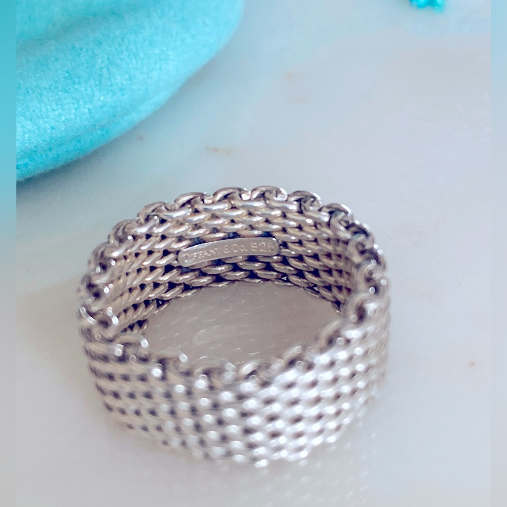 Tiffany Sterling Silver mesh ring + branded storage pouch. Size 7.